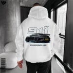 Back view of a person wearing a white oversized hoodie featuring a large graphic of a black Porsche 911 GT3 car and "911 GT3 PORSCHE" text.