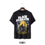Black oversized t-shirt featuring a large graphic of the Grim Reaper, a graveyard, and the text "Black Sabbath Born in a Graveyard Adopted by Sin."