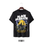 Black oversized t-shirt featuring a large graphic of the Grim Reaper, a graveyard, and the text "Black Sabbath Born in a Graveyard Adopted by Sin."