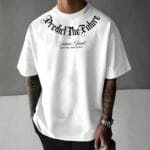 Front view of a man wearing a white oversized t-shirt with black text saying "Predict The Future" in gothic font, and "Success Final CONTINUE THAT COUNTS" below it.